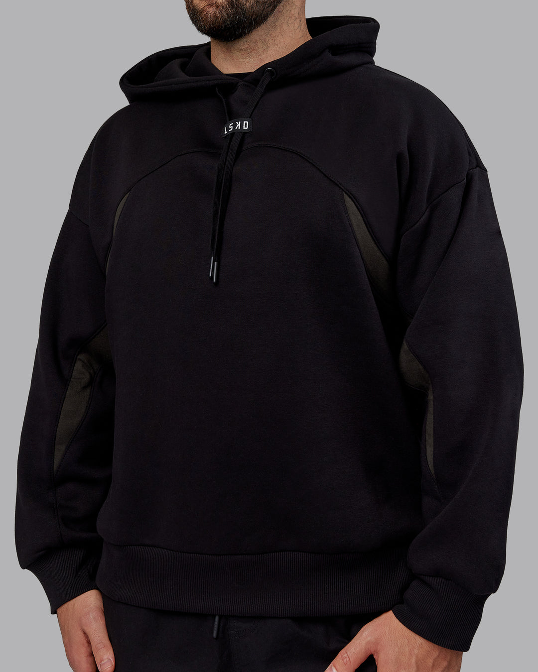 Man wearing Unisex Y2K Concept Panel Hoodie - Black-Pirate Black