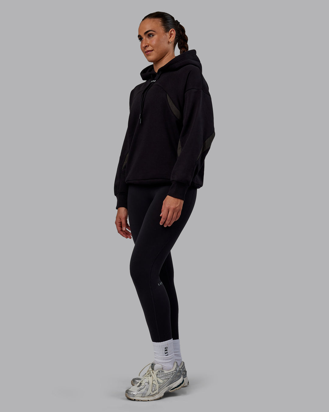 Woman wearing Unisex Y2K Concept Panel Hoodie - Black-Pirate Black