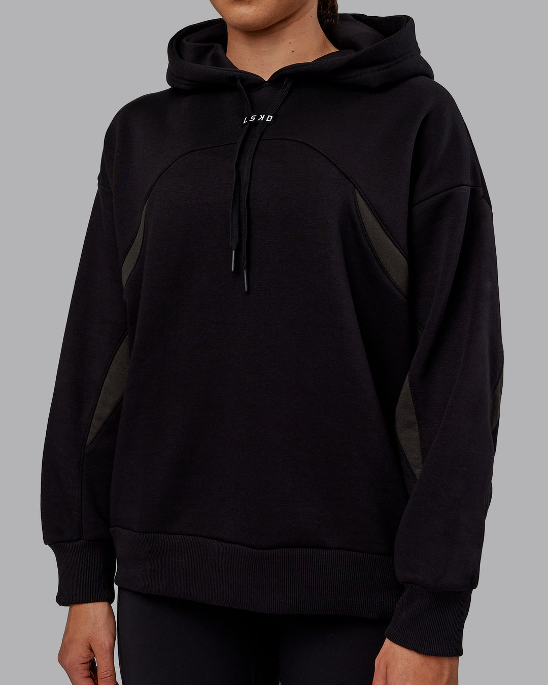 Woman wearing Unisex Y2K Concept Panel Hoodie - Black-Pirate Black