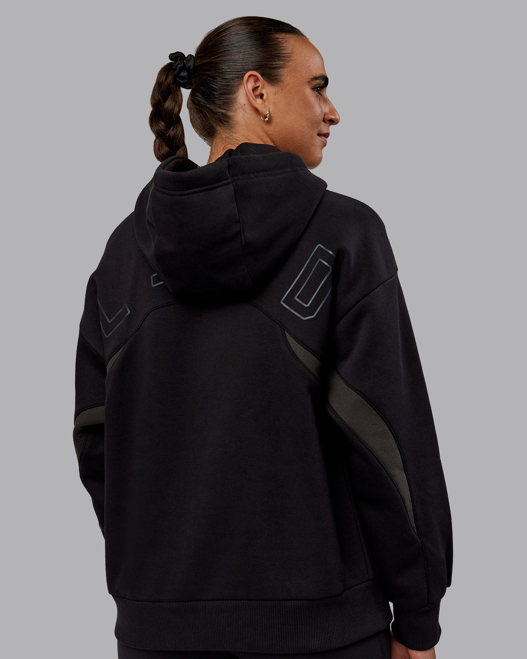 Woman wearing Unisex Y2K Concept Panel Hoodie - Black-Pirate Black