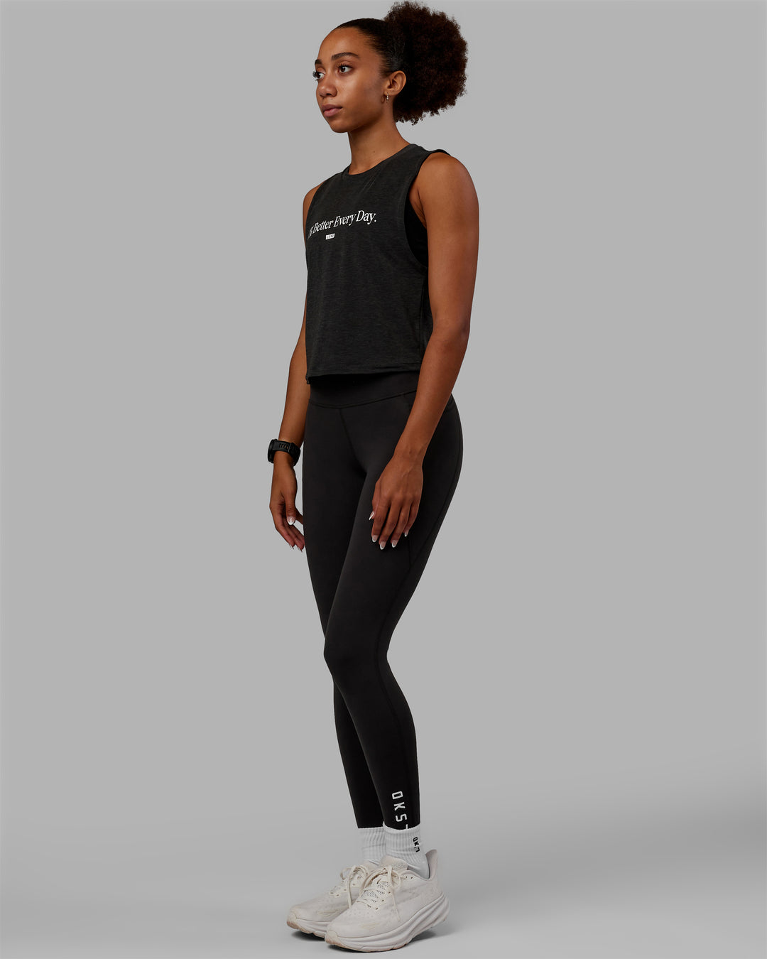 Woman wearing Vital 1% Better Cropped Training Tank - Charcoal Marl-White