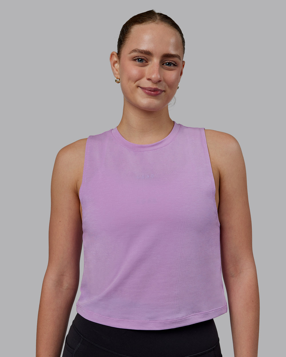 Woman wearing Vital Cropped Training Tank - Light Violet