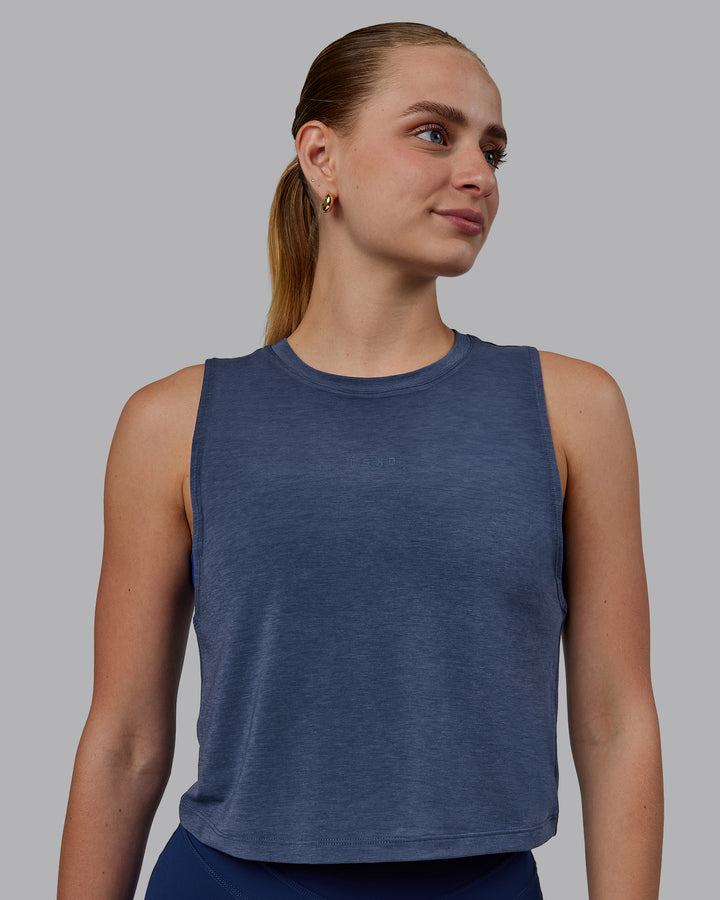 Woman wearing Vital Cropped Training Tank - Midnight Blue
