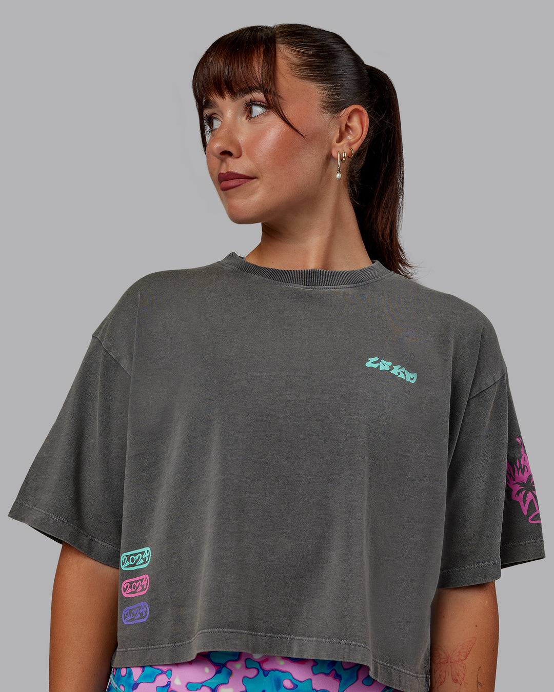 Woman wearing Washed Huntington 24 Cropped Heavyweight Tee - Charcoal-Dahlia Purple