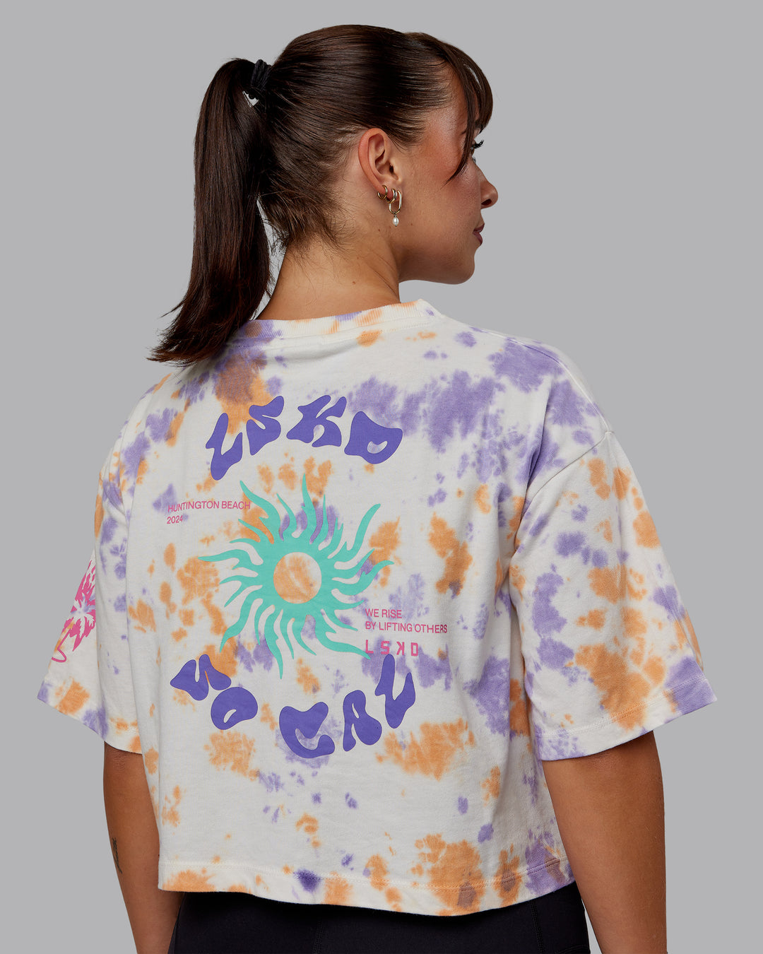 Woman wearing Washed Huntington 24 Cropped Heavyweight Tee - Tie Dye Tangerine-Dahlia Purple