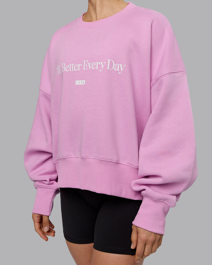 Woman wearing 1% Better Heavyweight Sweater - Pastel Orchid-White
