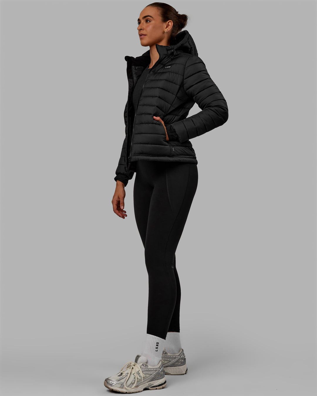 Woman wearing All-day Puffer Jacket - Black