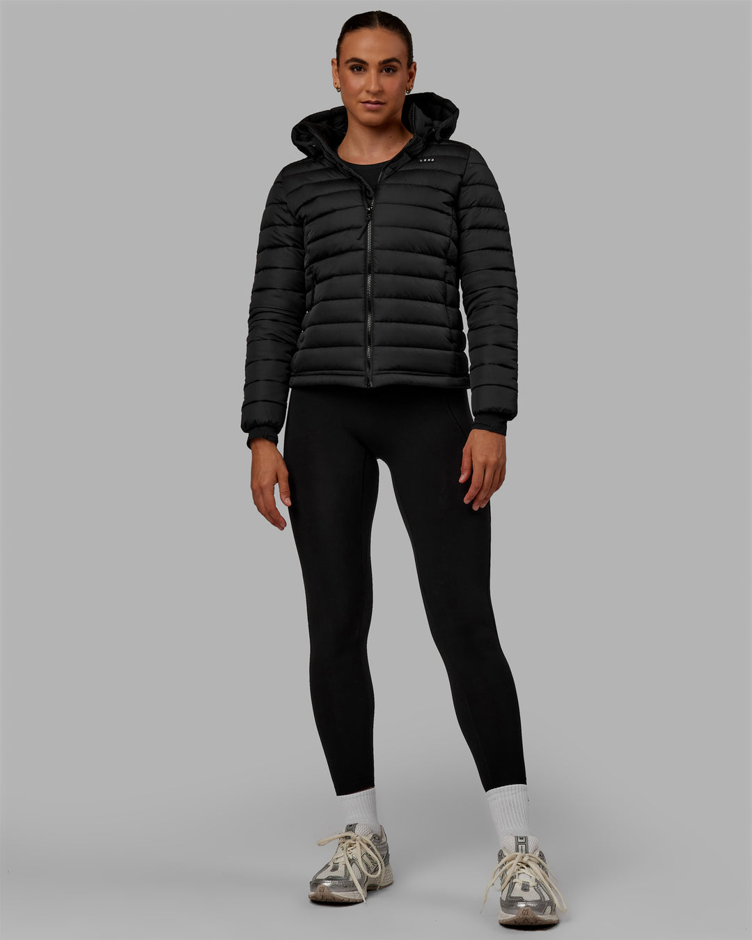 Woman wearing All-day Puffer Jacket - Black