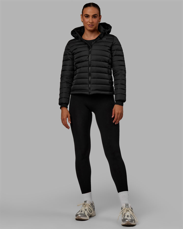 Woman wearing All-day Puffer Jacket - Black
