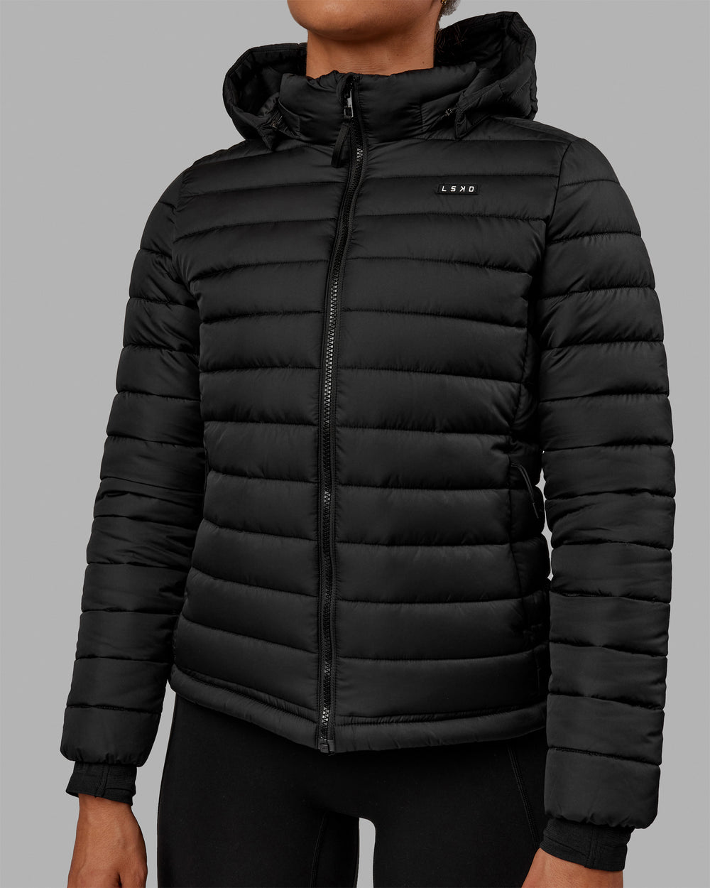 Woman wearing All-day Puffer Jacket - Black