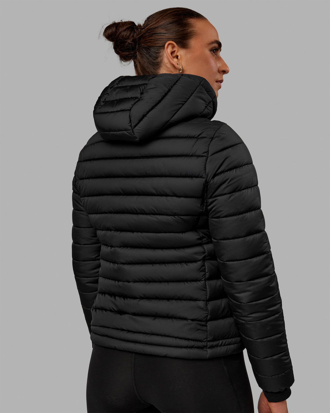 Woman wearing All-day Puffer Jacket - Black