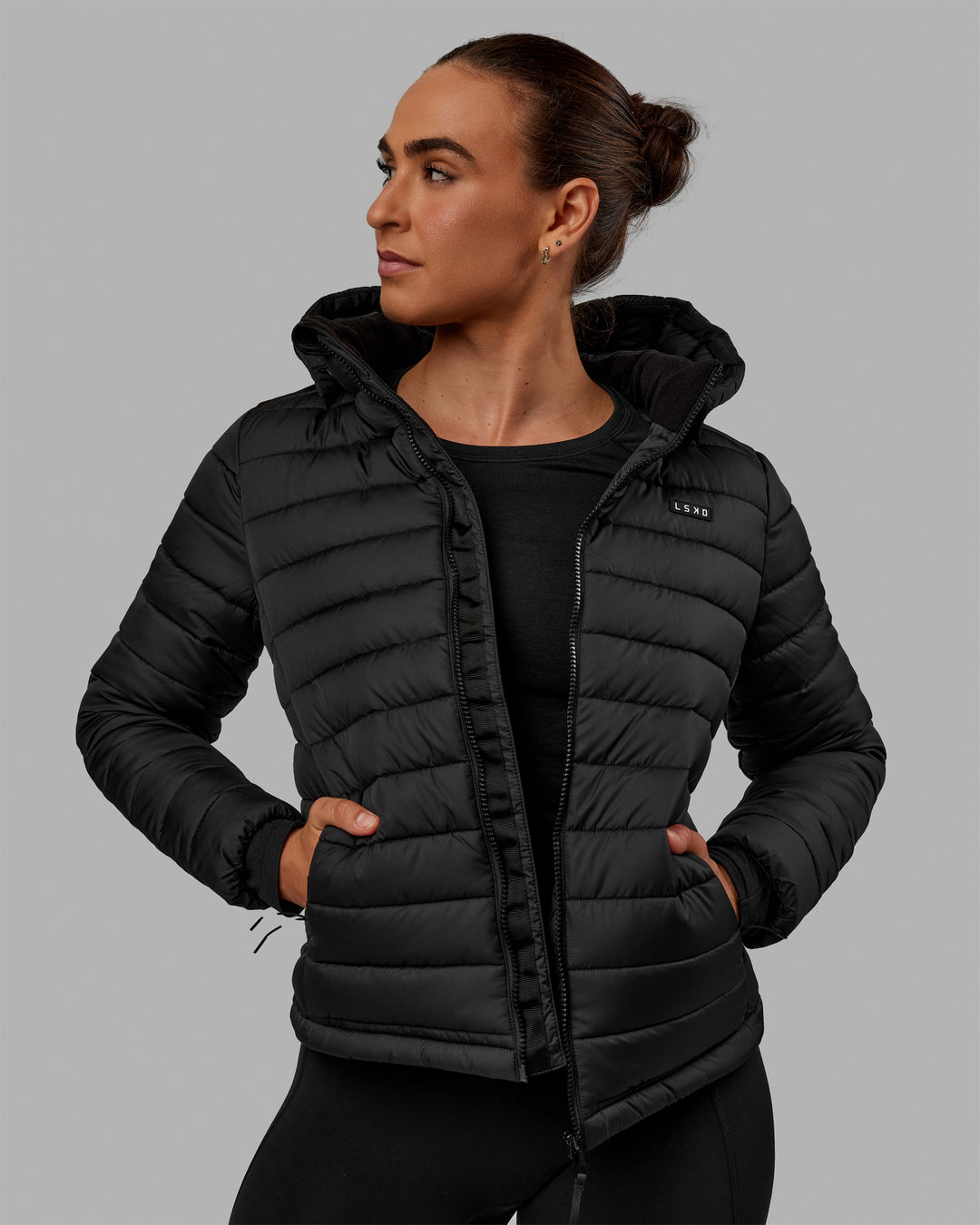 Woman wearing All-day Puffer Jacket - Black