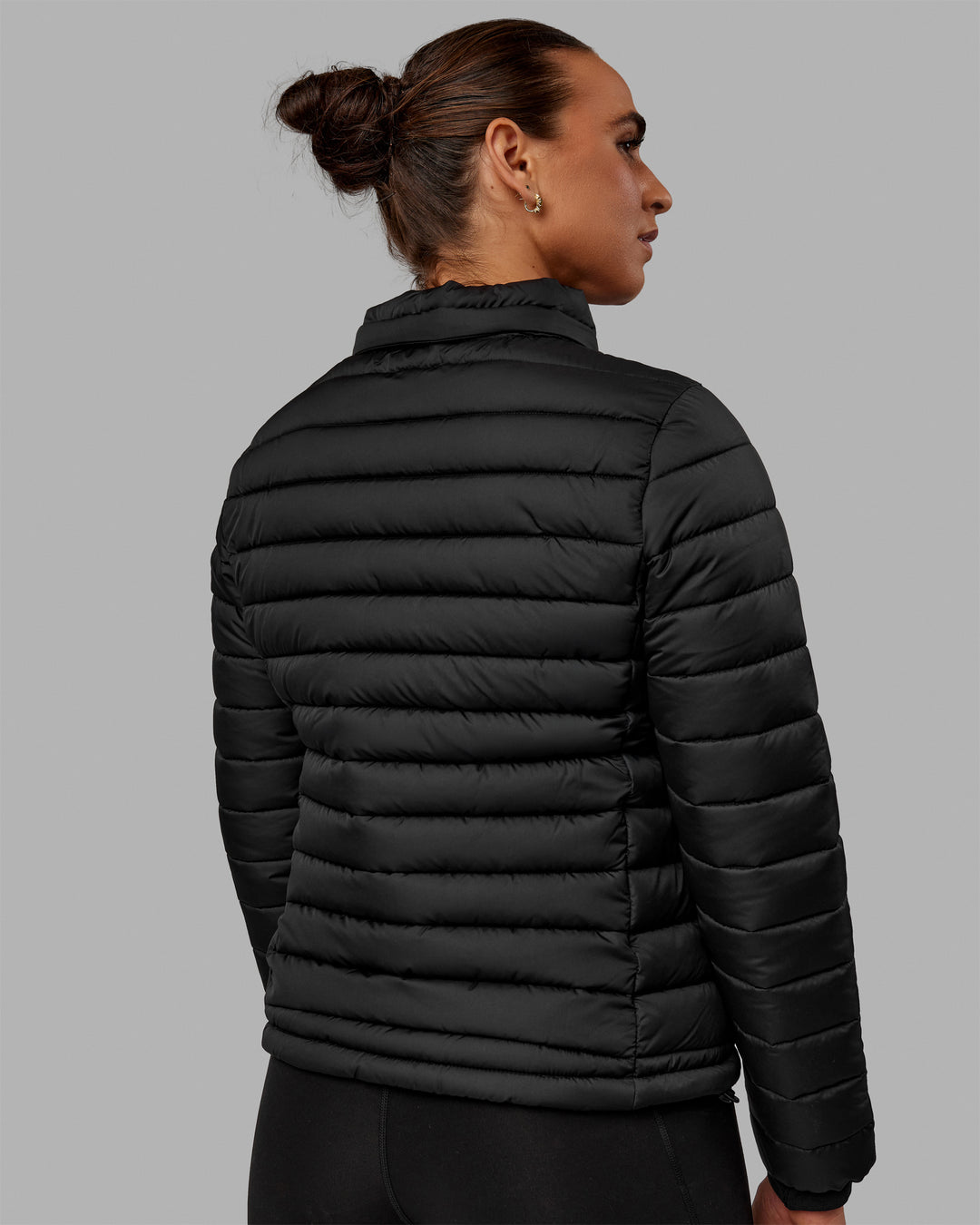 Woman wearing All-day Puffer Jacket - Black