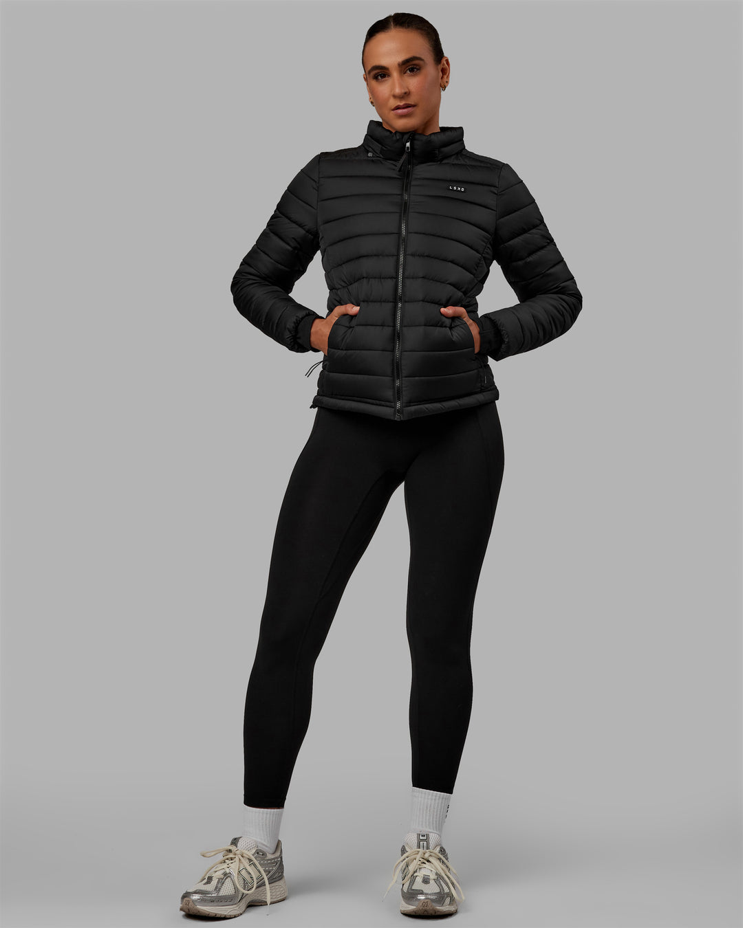 Woman wearing All-day Puffer Jacket - Black