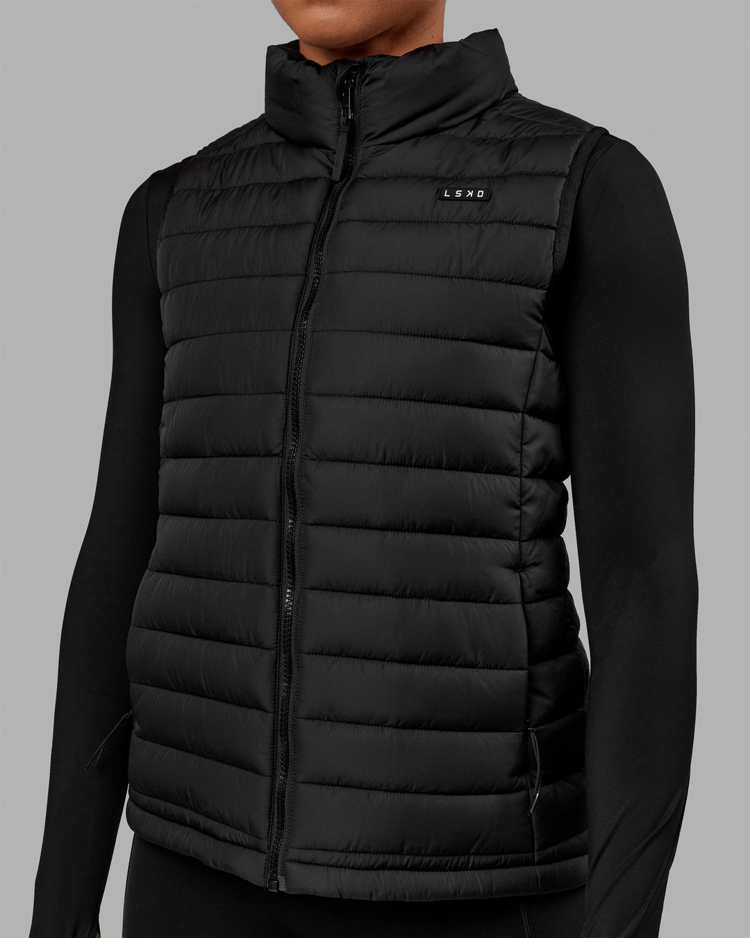 Woman wearing All-day Puffer Vest - Black