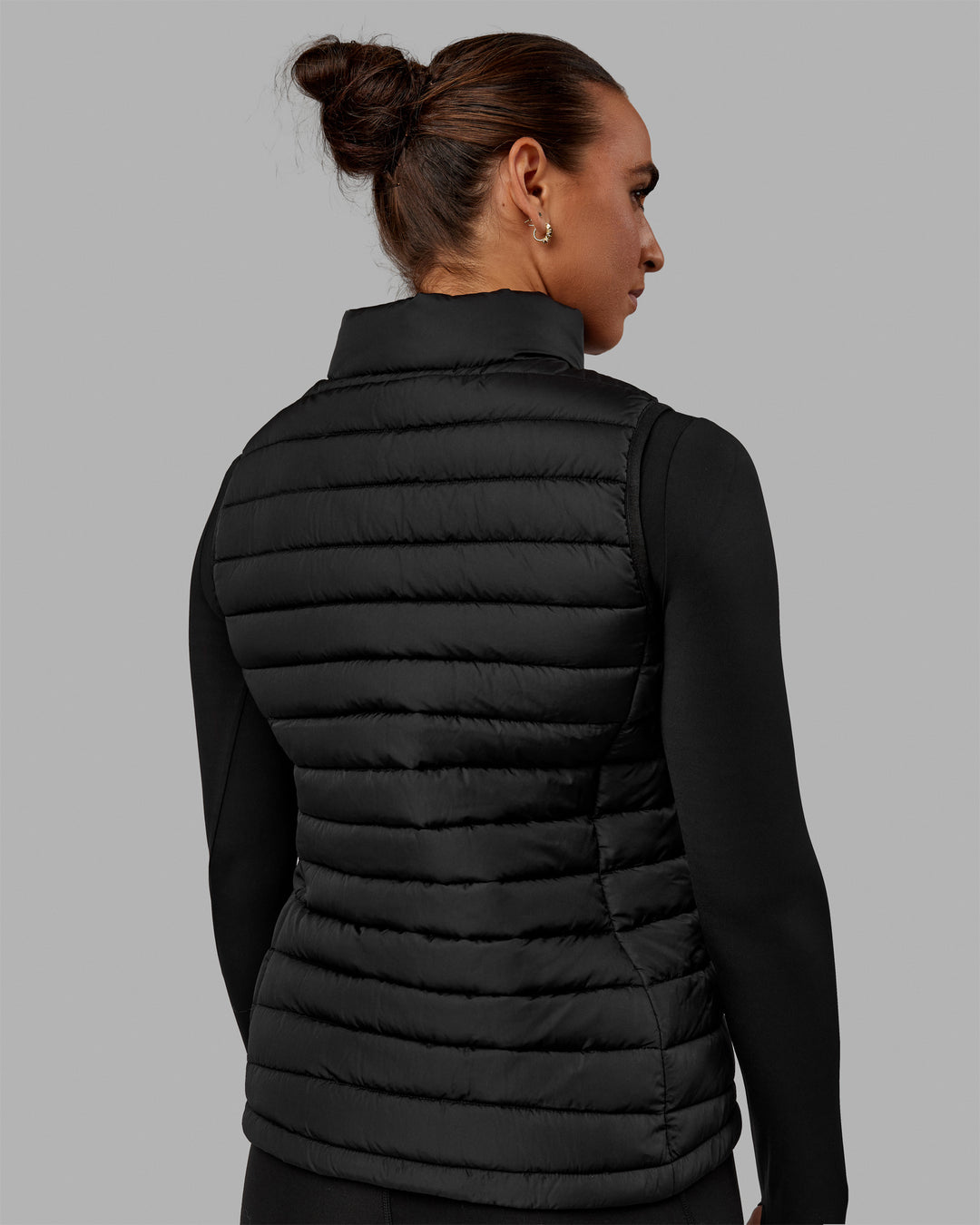 Woman wearing All-day Puffer Vest - Black