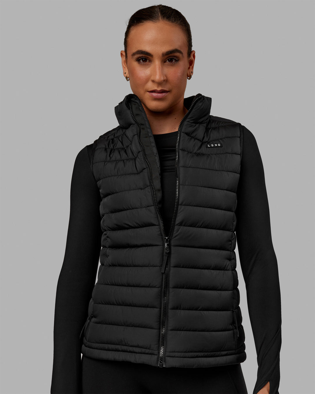 Woman wearing All-day Puffer Vest - Black