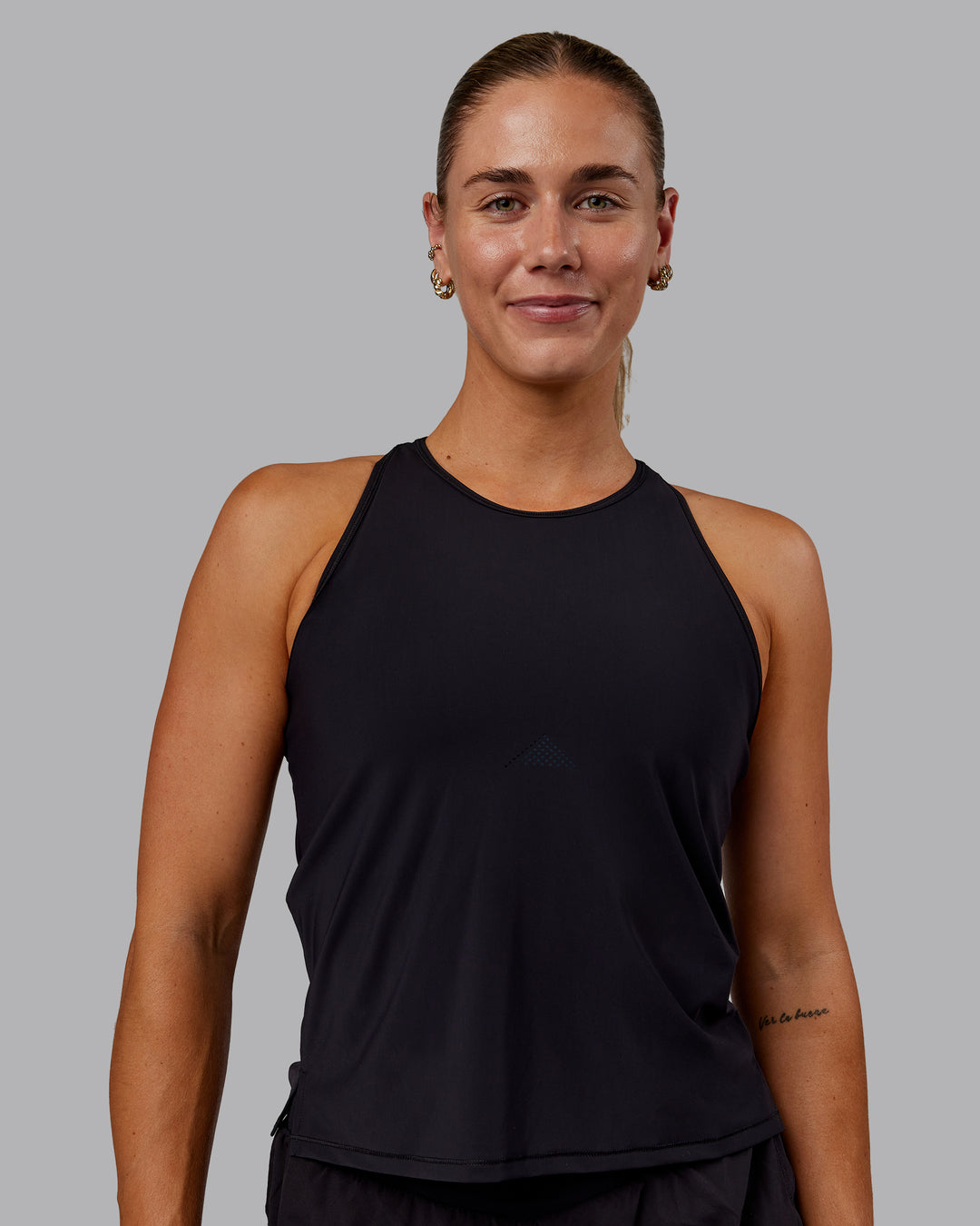 Woman wearing Cadence Tank - Black