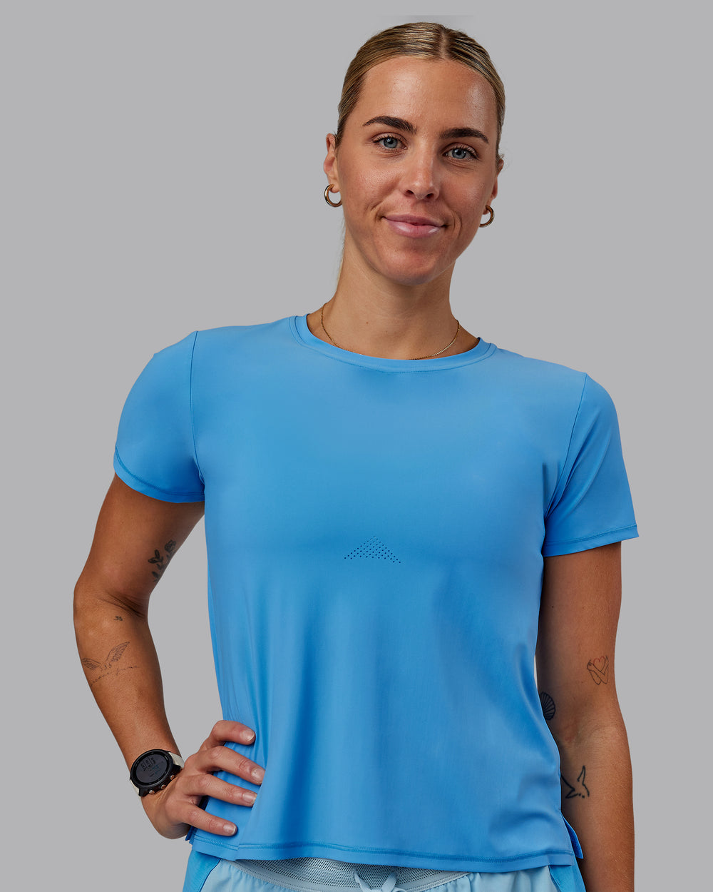 Woman wearing Cadence Tee - Azure Blue