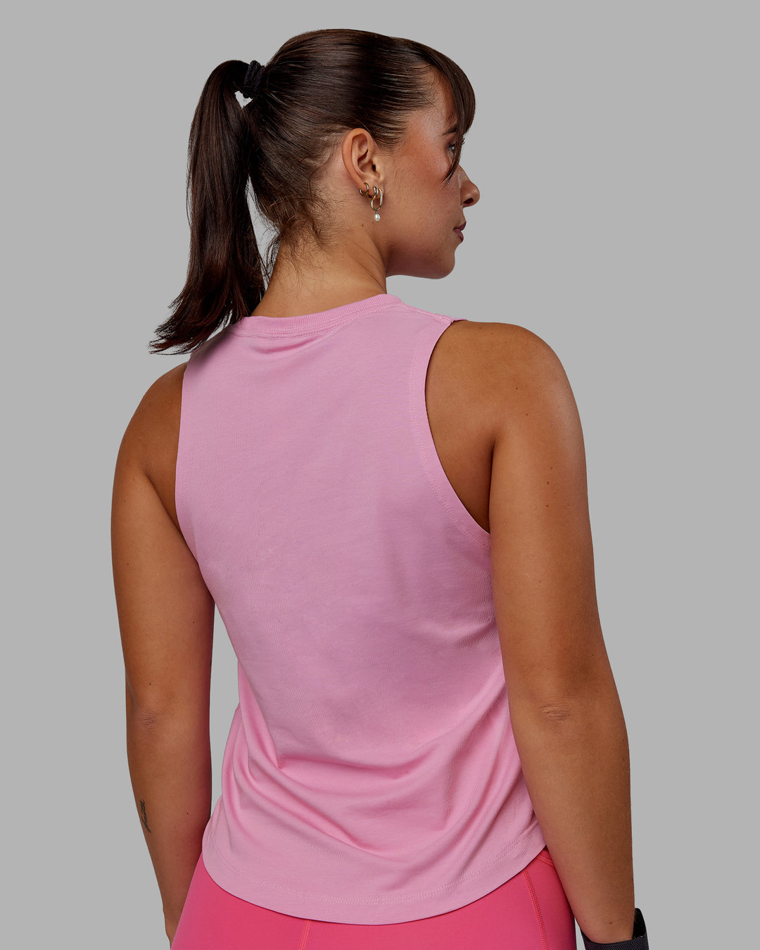 Woman wearing Deluxe PimaFLX Tank - Bubblegum