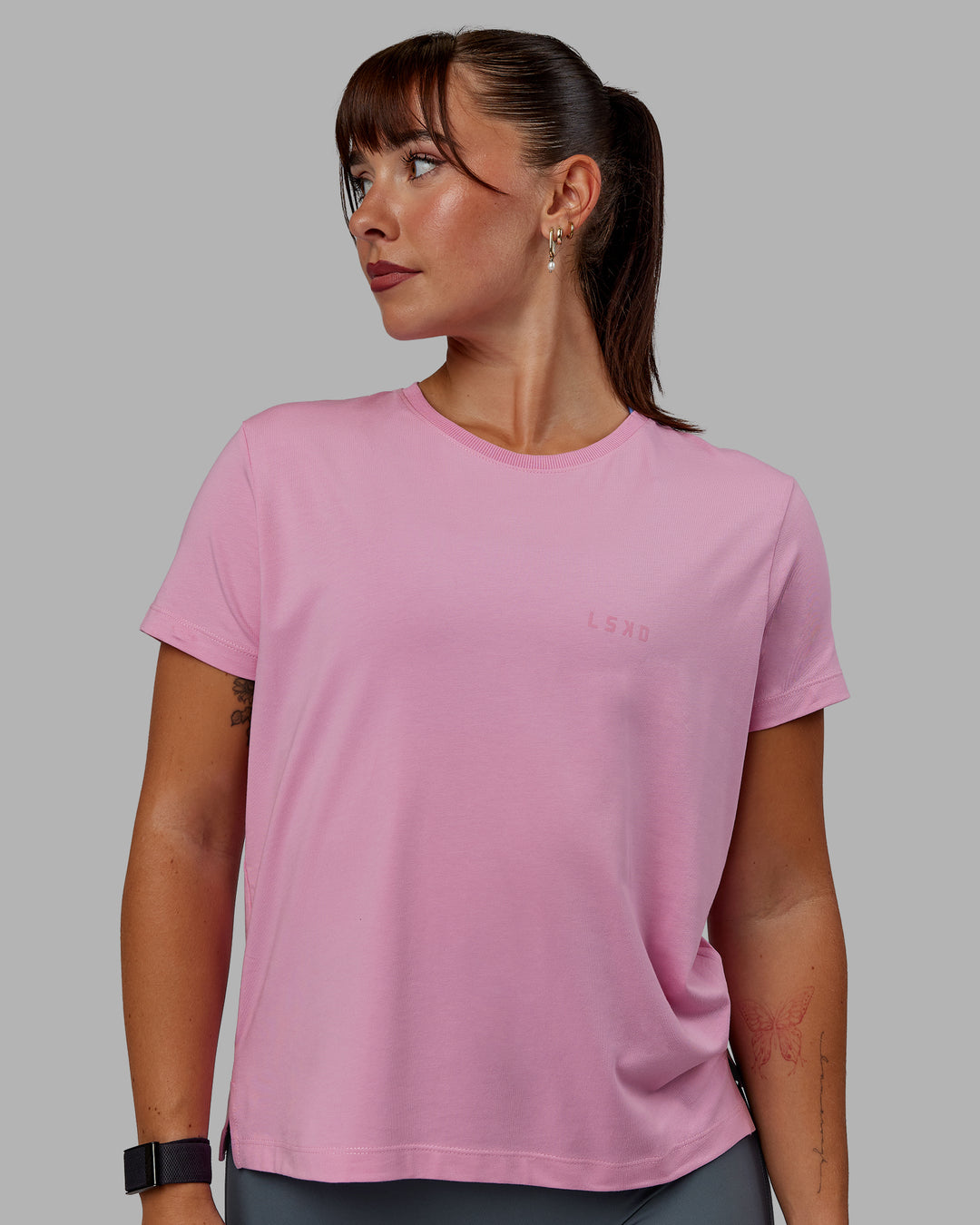 Woman wearing Deluxe PimaFLX Tee - Bubblegum