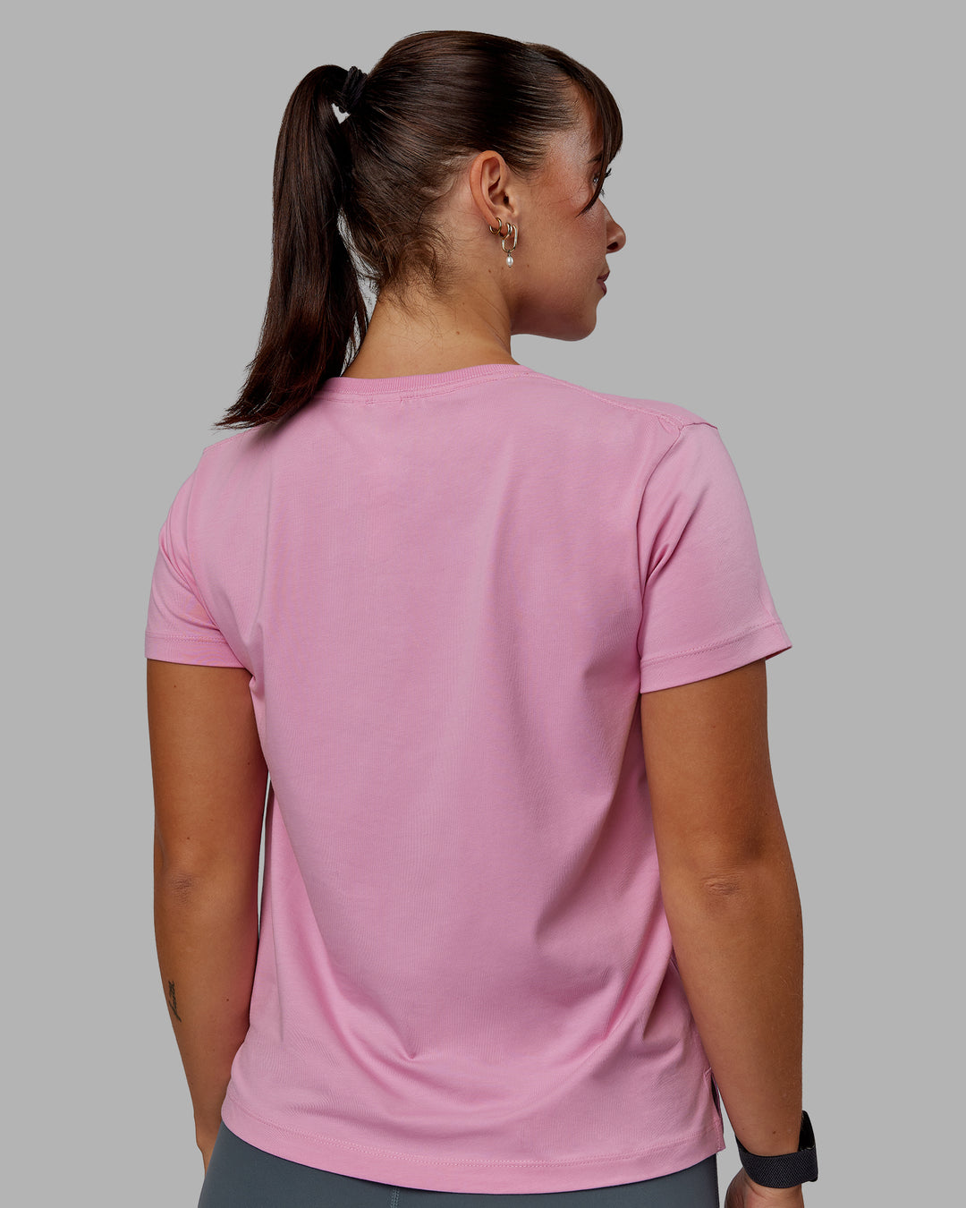 Woman wearing Deluxe PimaFLX Tee - Bubblegum