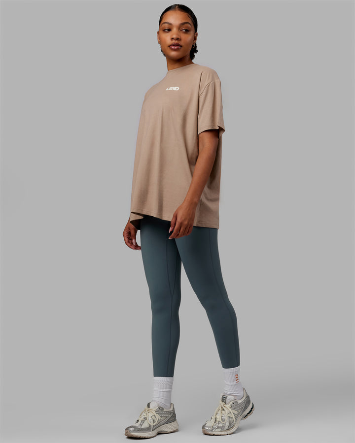 Woman wearing E.T.J FLXCotton Oversized Tee - Taupe-Arctic Blue
