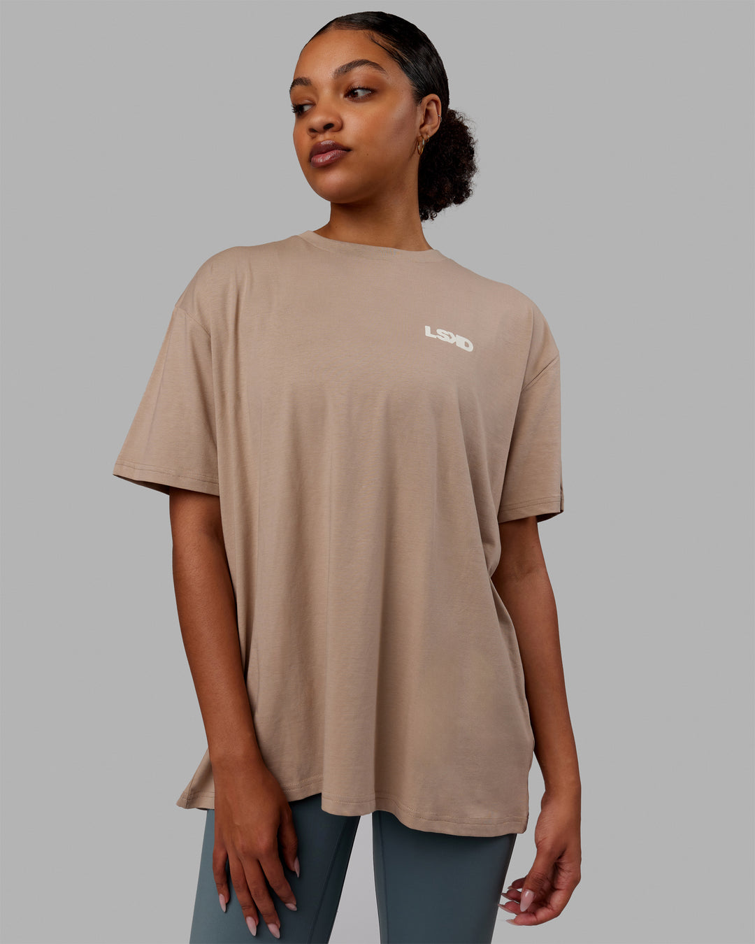 Woman wearing E.T.J FLXCotton Oversized Tee - Taupe-Arctic Blue