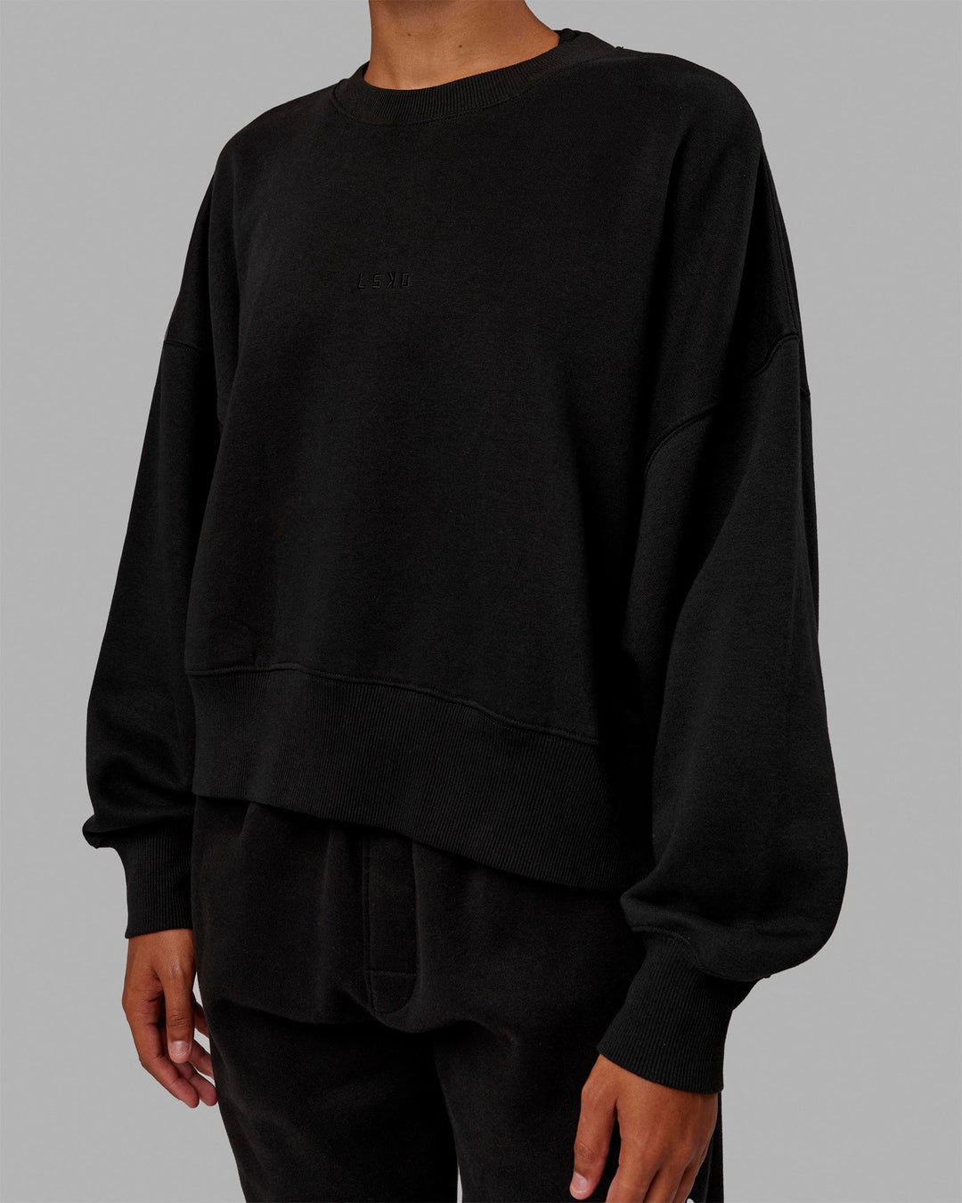 Woman wearing MVP Oversized Sweater - Black-Black