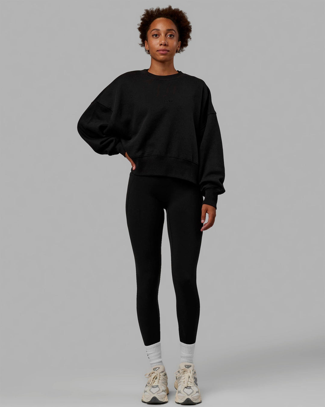 Woman wearing MVP Oversized Sweater - Black-Black