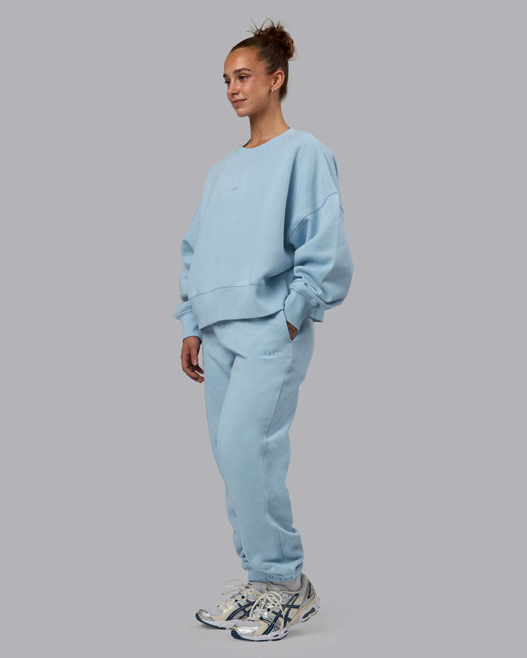 Woman wearing MVP Track Pants - Glacial Blue