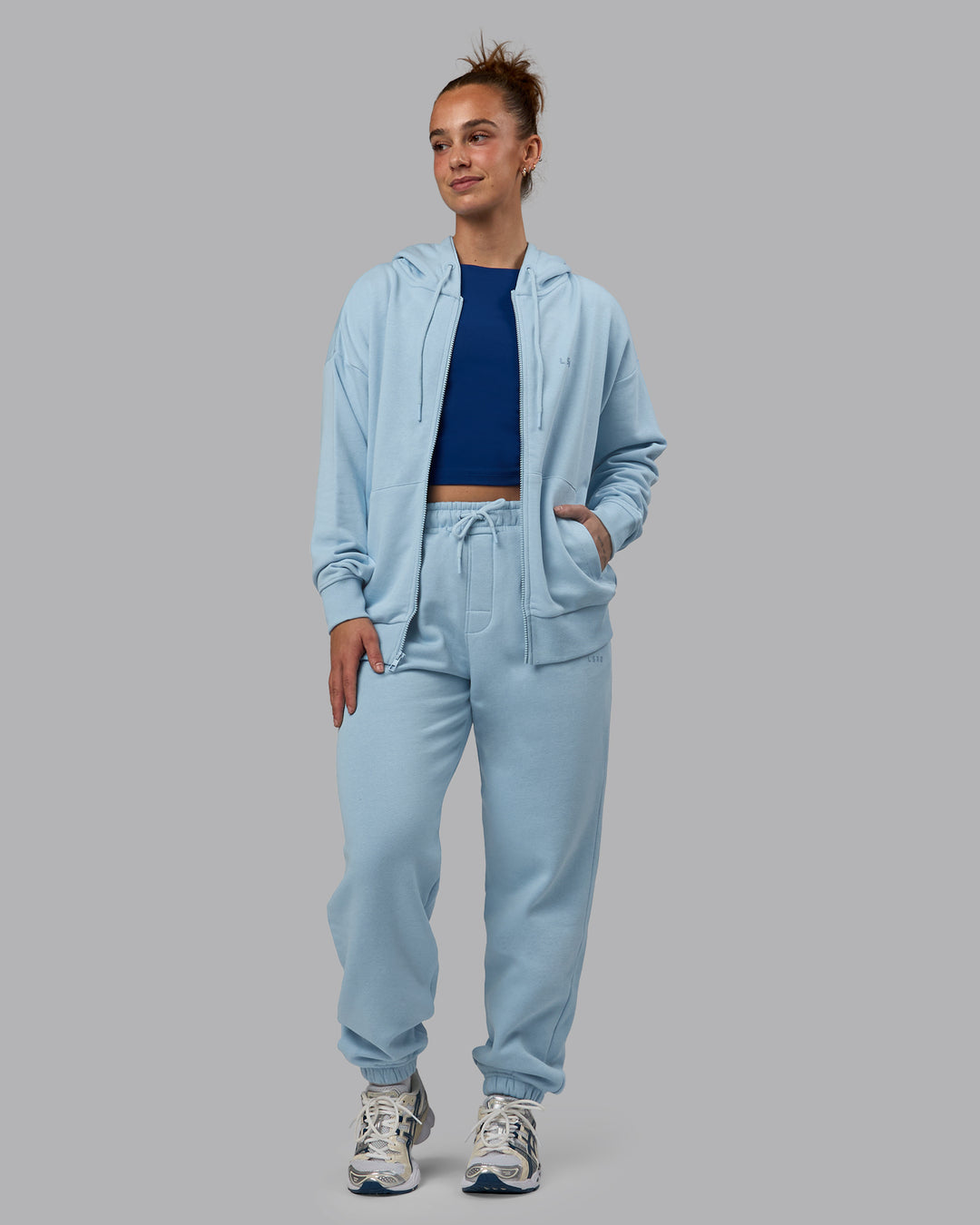 Woman wearing MVP Track Pants - Glacial Blue