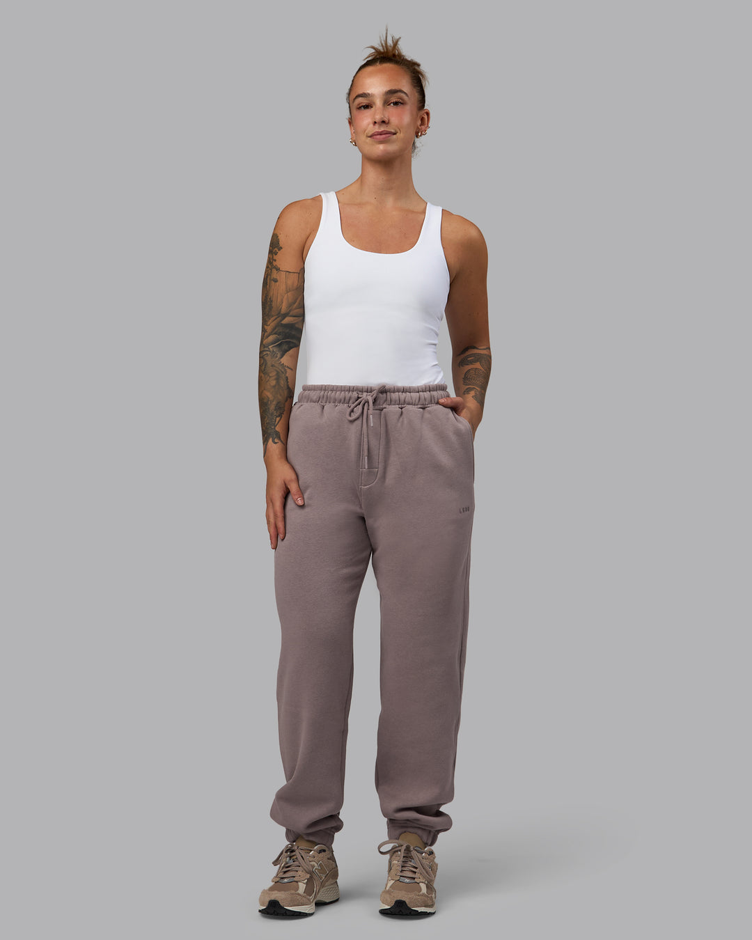 Woman wering Woman wearing MVP Track Pants - Glacial Blue