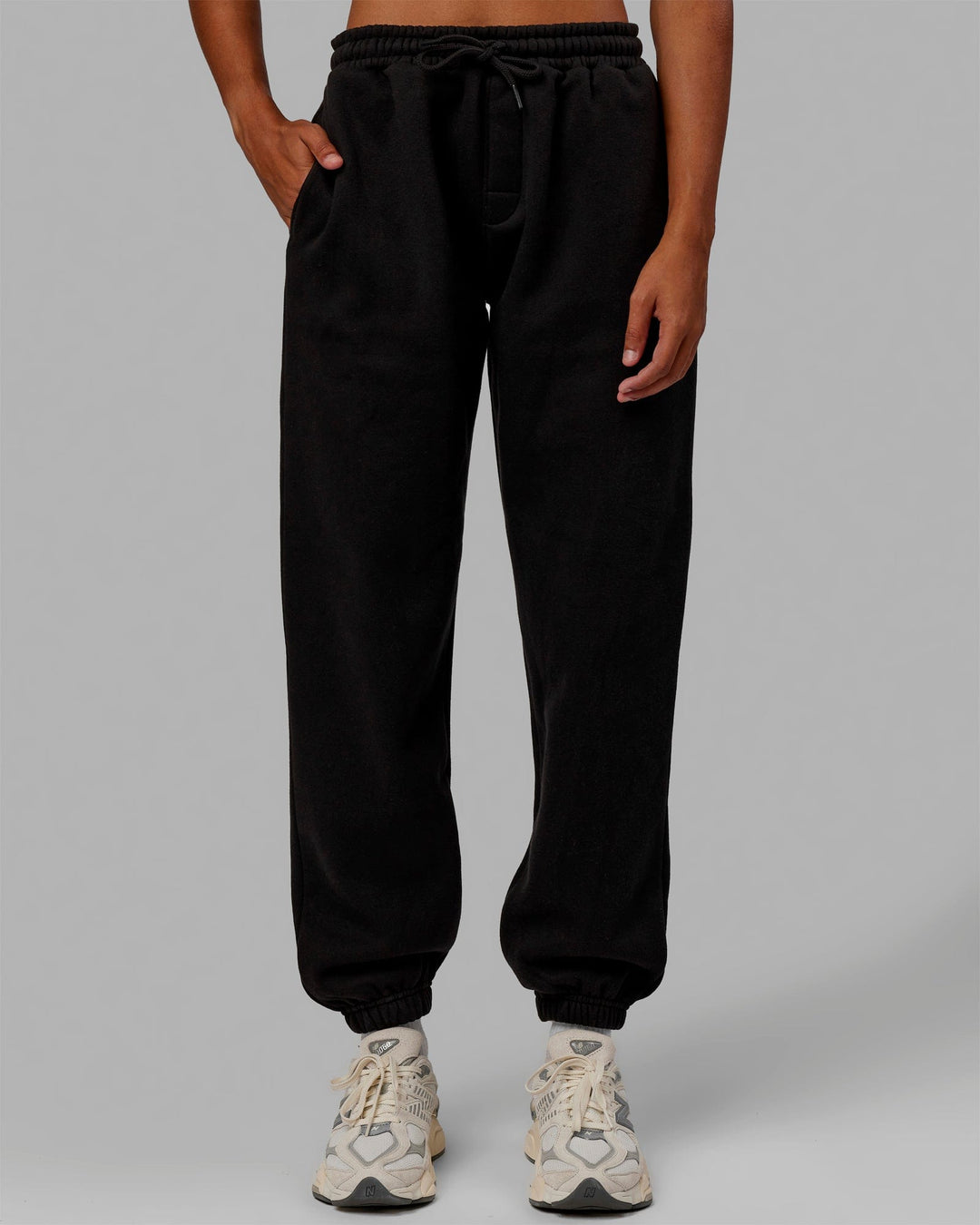 Woman wearing MVP Track Pants - Black-Black