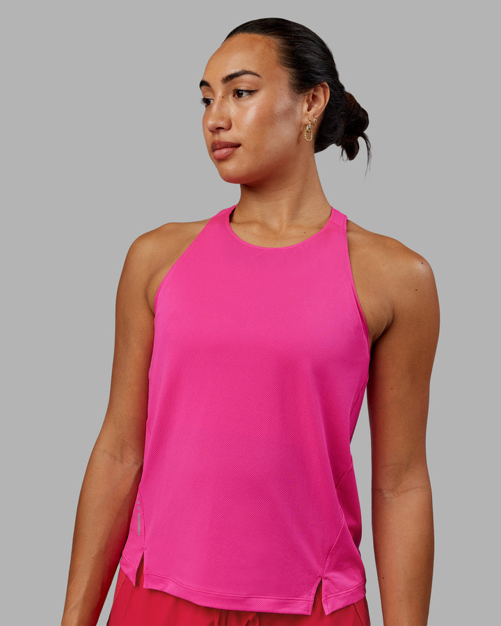 Woman wearing Pace Running Tank - Ultra Pink
