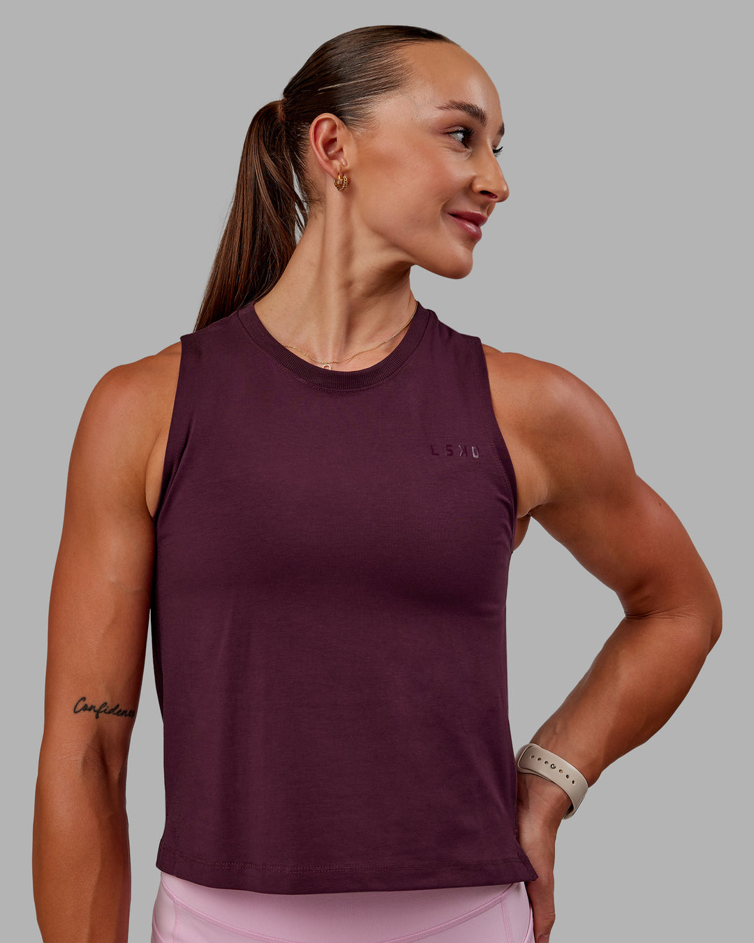 Woman wearing Deluxe PimaFLX Tank - Cherry Lacquer