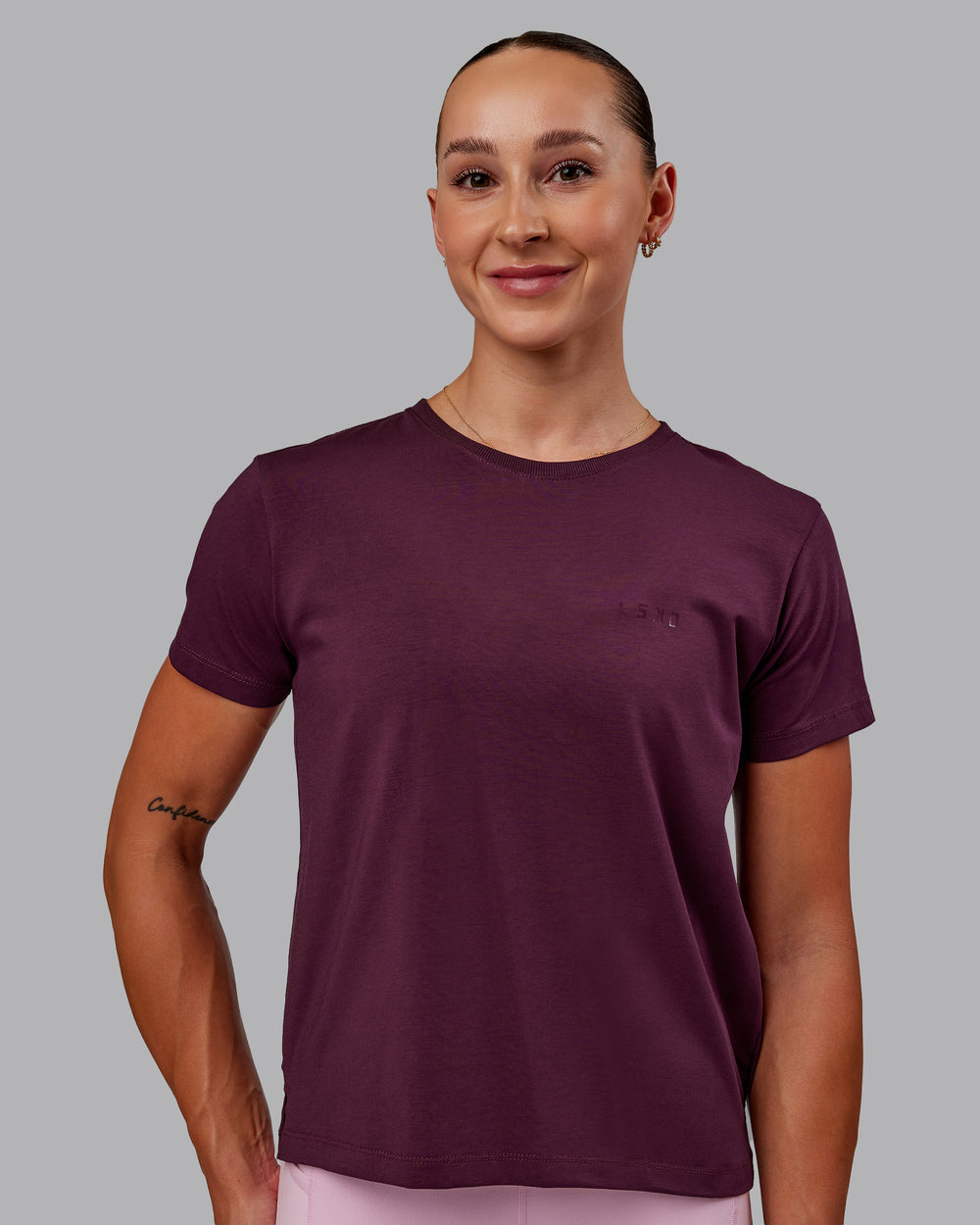 Woman wearing Deluxe PimaFLX Tee - Cherry Lacquer