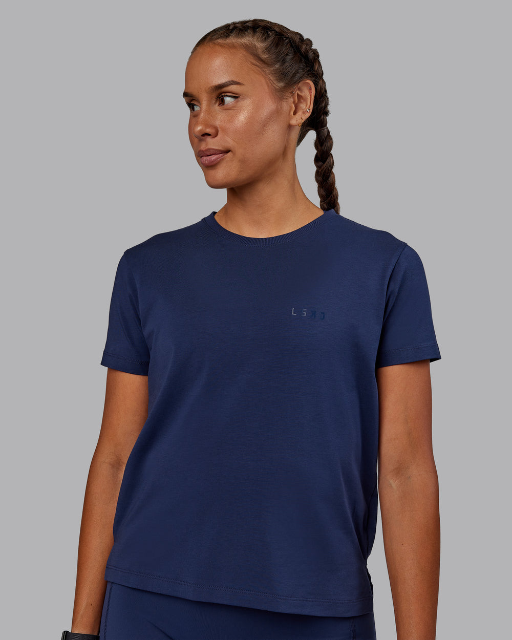 Woman wearing Deluxe PimaFLX Tee - Future Navy