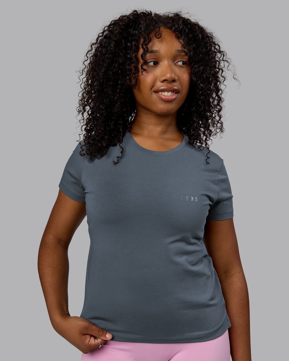 Woman wearing Deluxe PimaFLX Tee - Turbulence