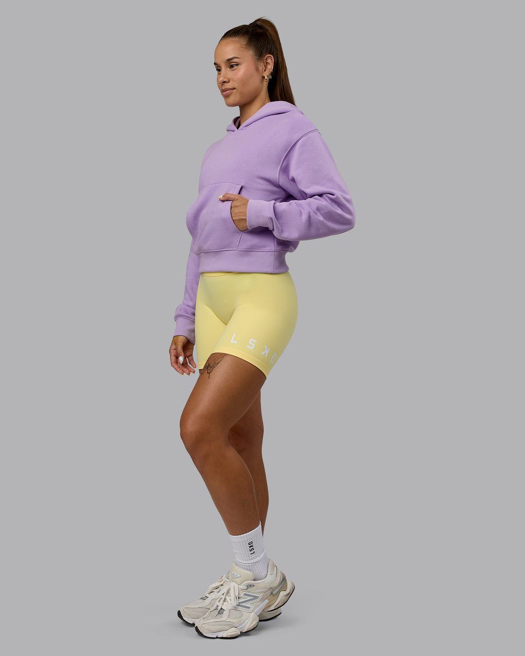 Woman wearing Set The Standard Midweight Hoodie - Pale Lilac-Elfin Yellow