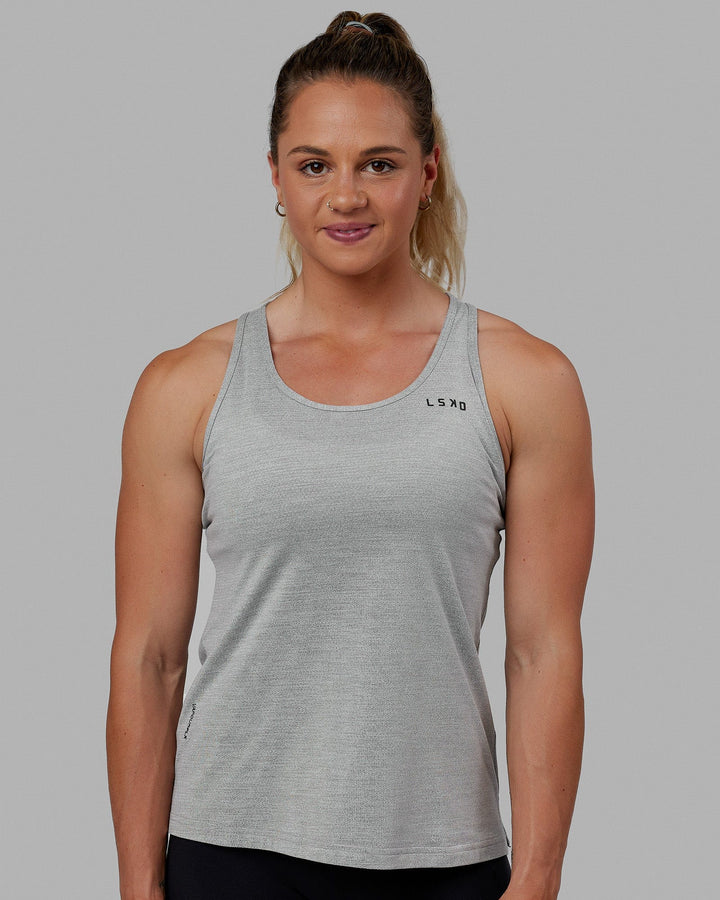 Woman wearing Perform VapourFLX Tank - Lt Grey Marl
