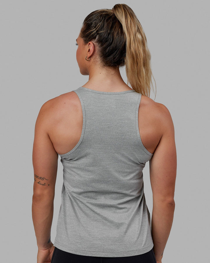 Woman wearing Perform VapourFLX Tank - Lt Grey Marl
