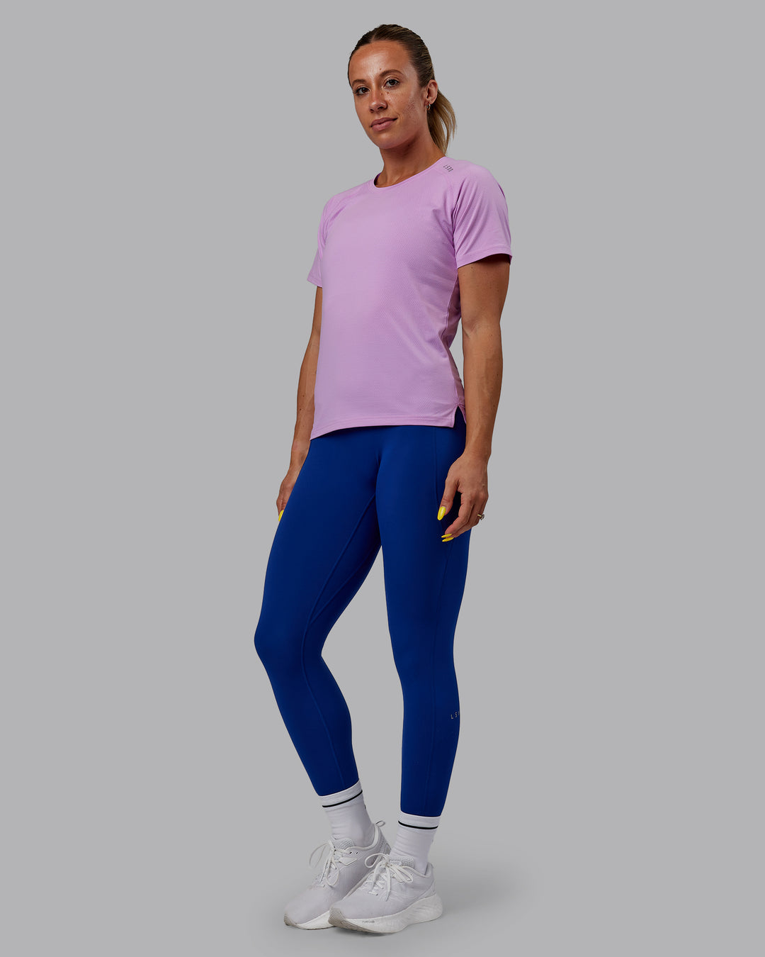 Woman wearing Perform VapourFLX Tee - Light Violet