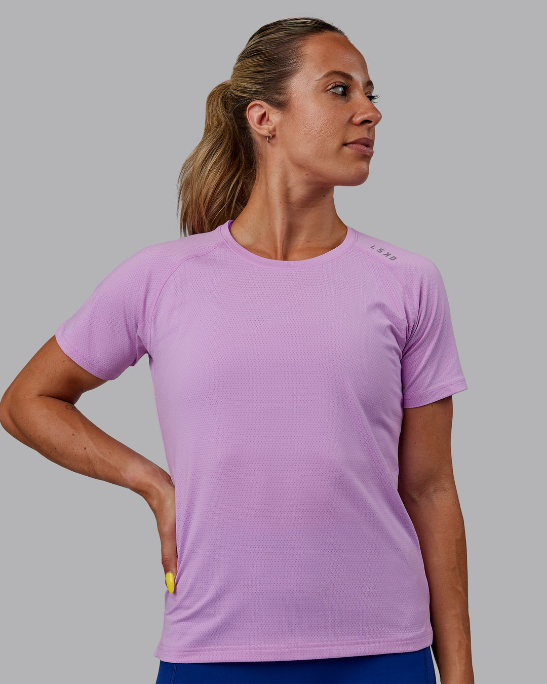 Woman wearing Perform VapourFLX Tee - Light Violet