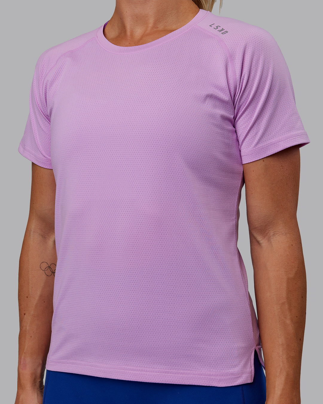 Woman wearing Perform VapourFLX Tee - Light Violet