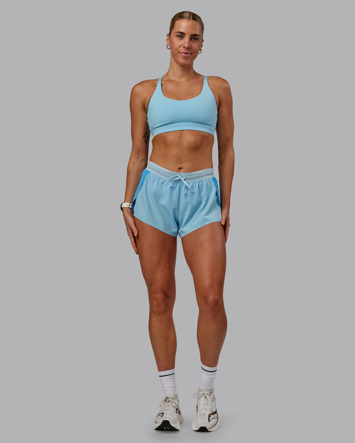 Woman wearing Accelerate 3&quot; Run Shorts - Sky Blue Colourblock
