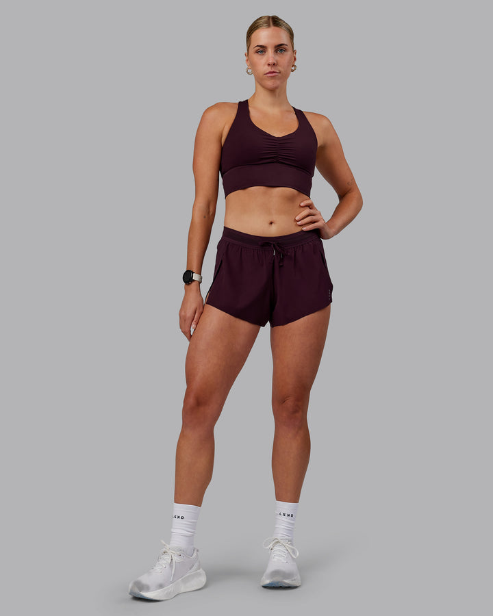 Woman wearing Accelerate 3&quot; Run Shorts - Mulberry
