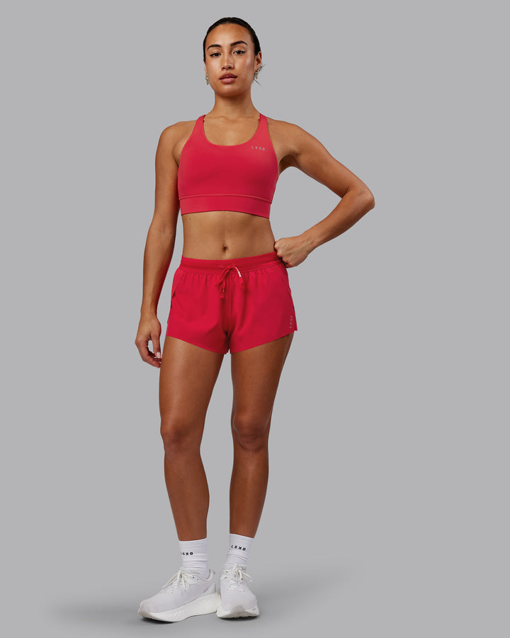 Woman wearing Accelerate Sports Bra - Scarlet
