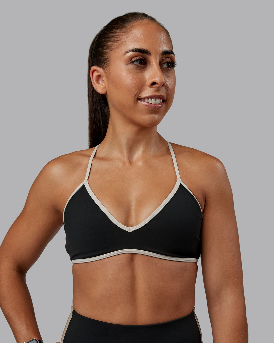 Woman wearing Ambience Sports Bra - Black-Multi | Model:Tylah | Size:S