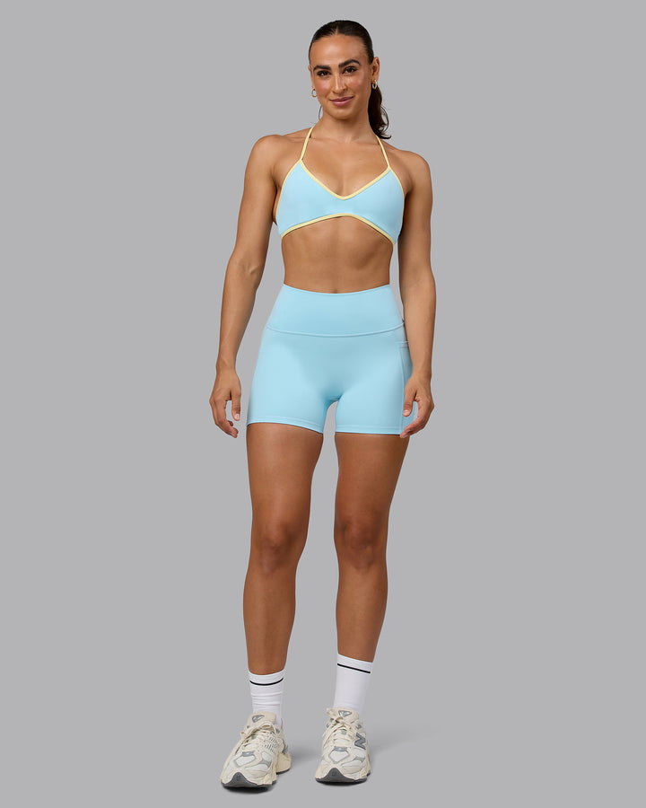 Woman wearing Ambience Sports Bra - Crystal Blue-Lemon
